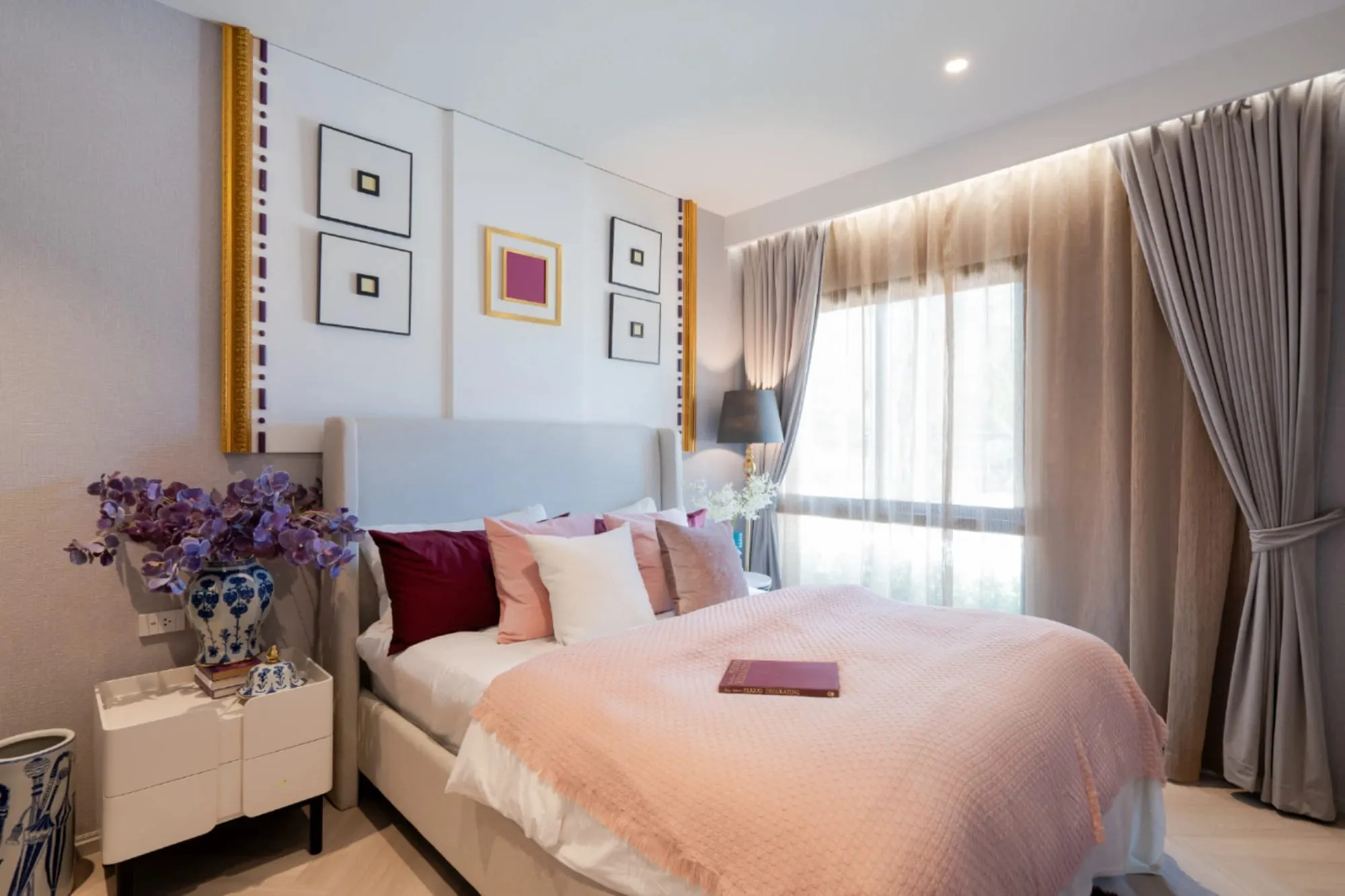 Bedroom with soft pink bedding